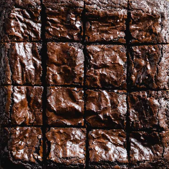 Close up of baked and cut brownie squares