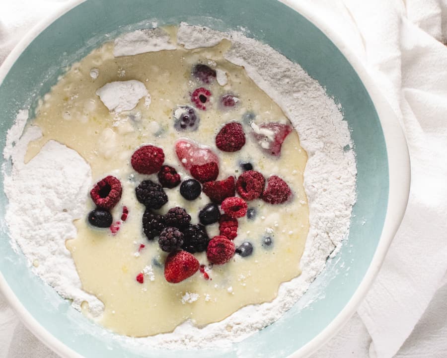 All ingredients in muffin recipe in a ceramic bowl before mixing.