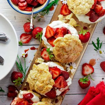 strawberry shortcakes on wooden board