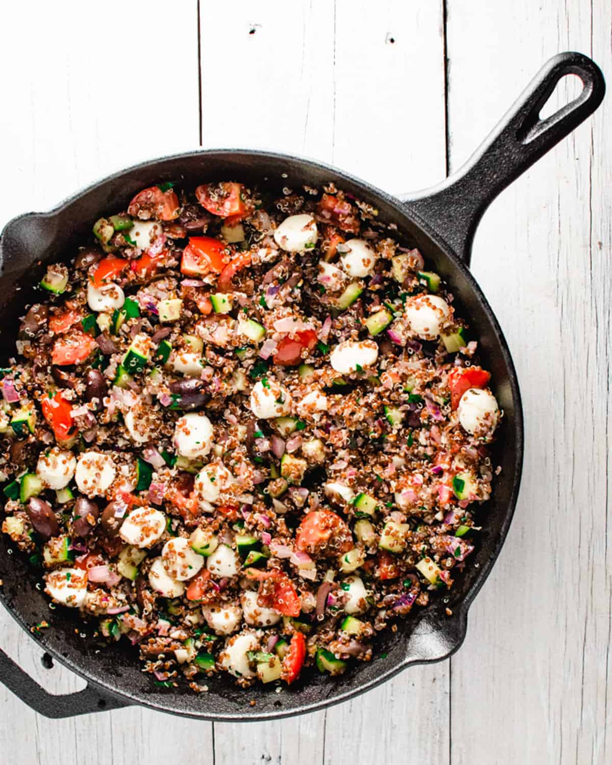 Cooked filling in cast iron skillet.