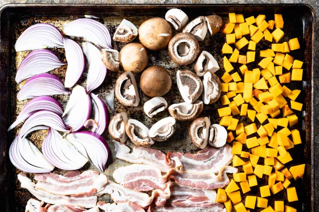 Ingredients for warm lentil salad prepped and on sheet pan.