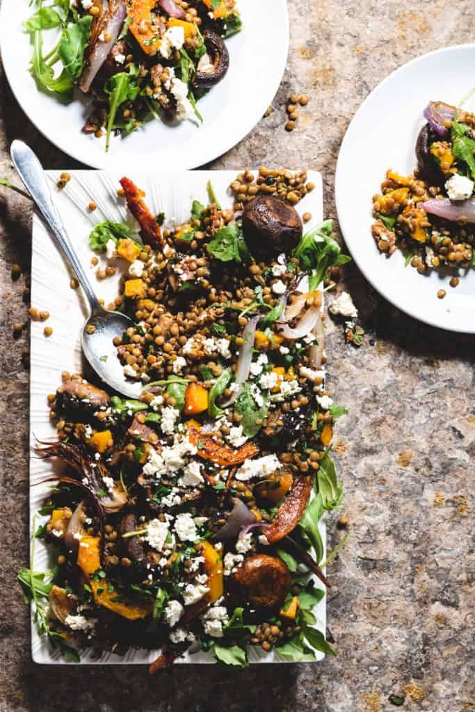 Warm Lentil Salad with roasted vegetables and bacon platter with 2 plates