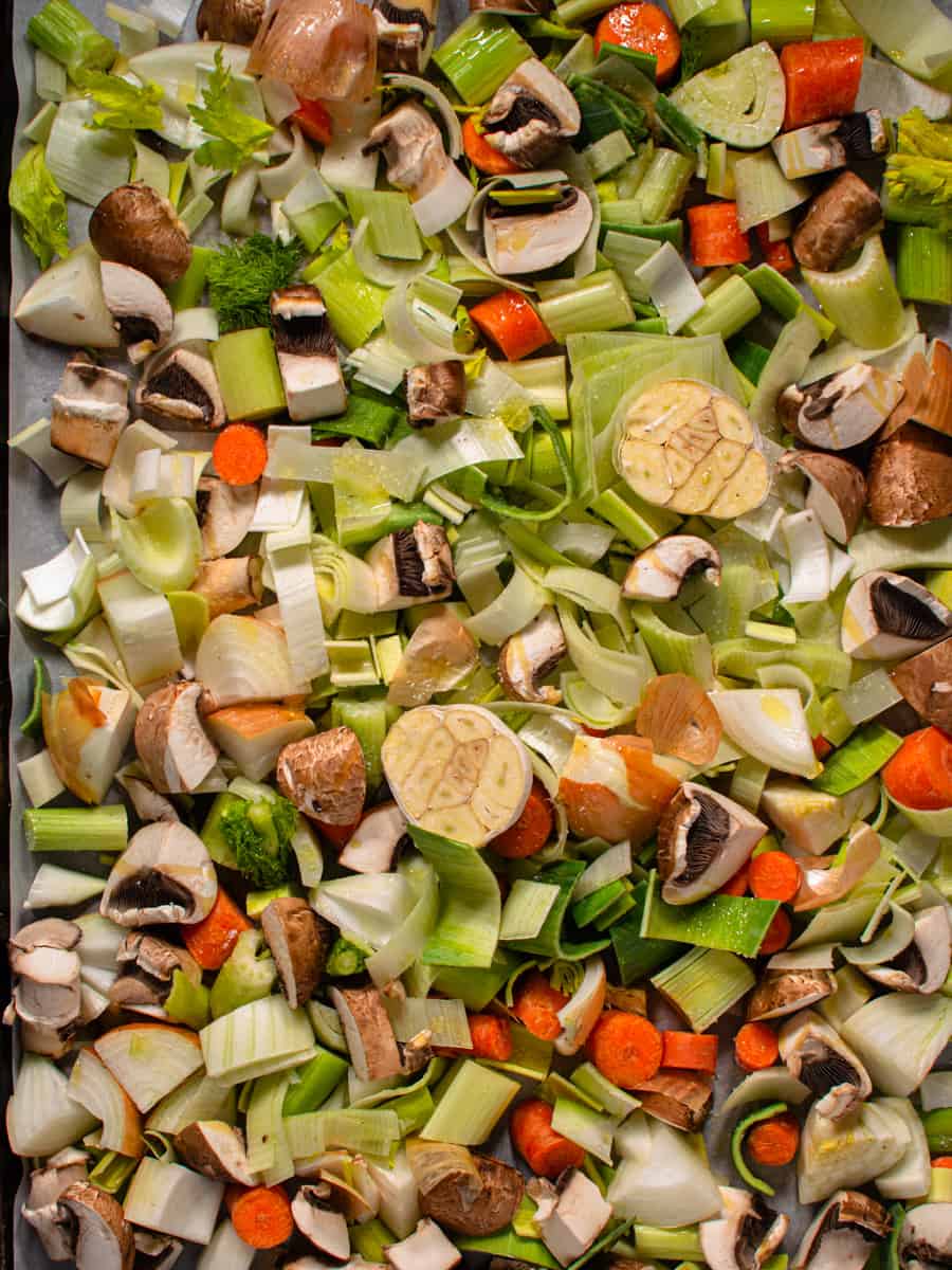 chopped vegetables on tray before roasting