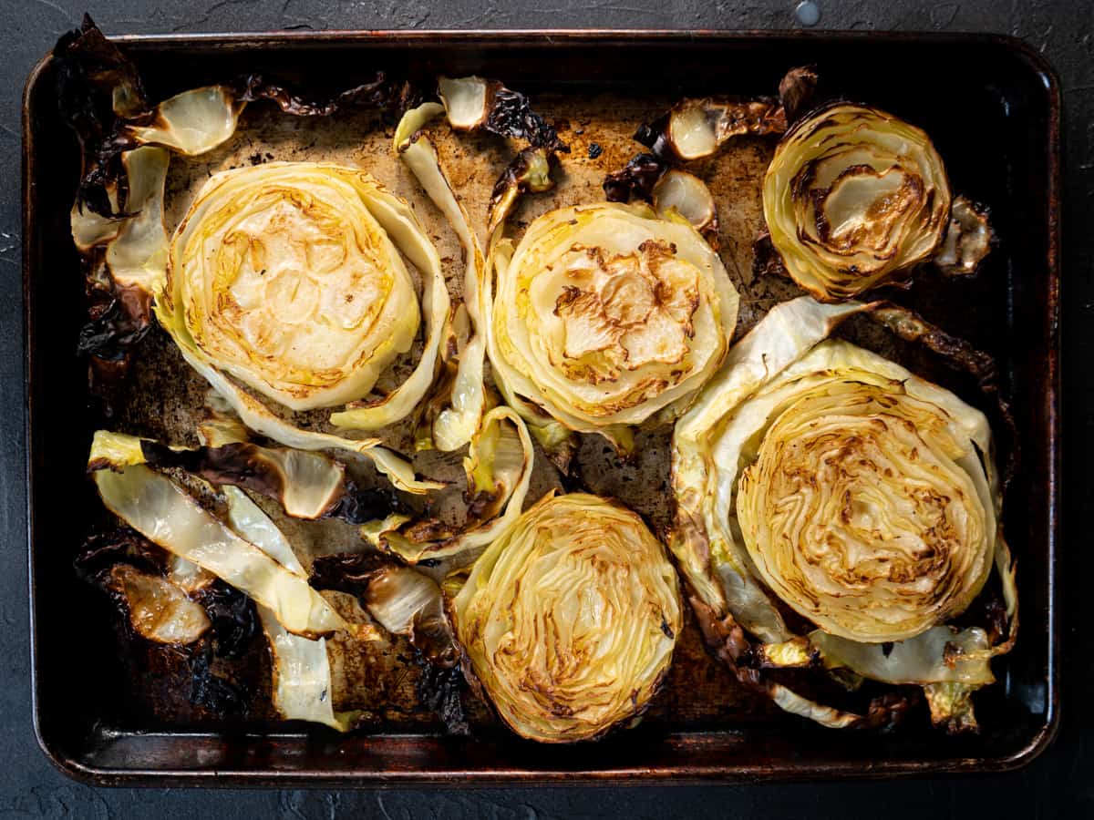 cabbage steaks after baking and before being topped with bacon and cheese.