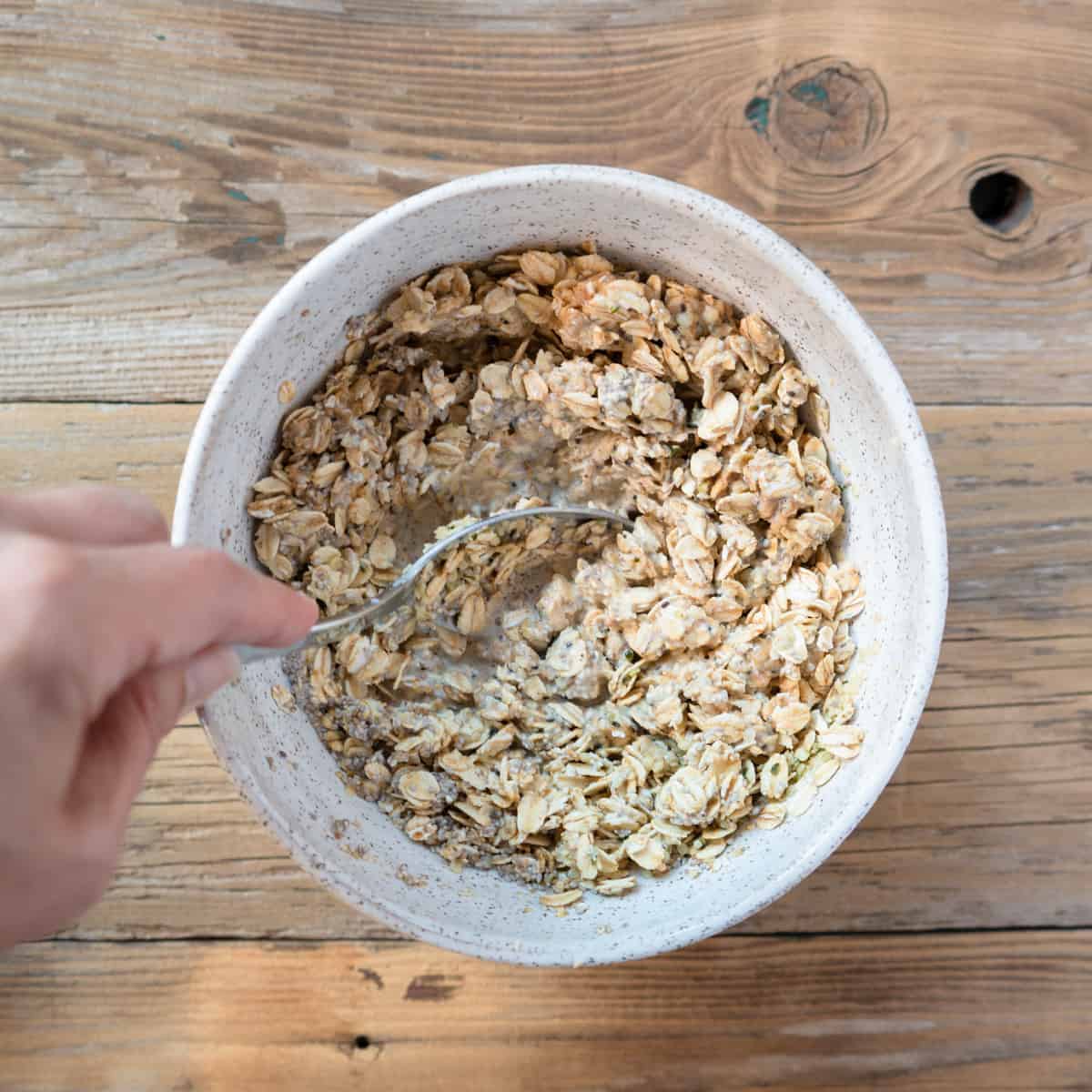 mixing together the ingredients.