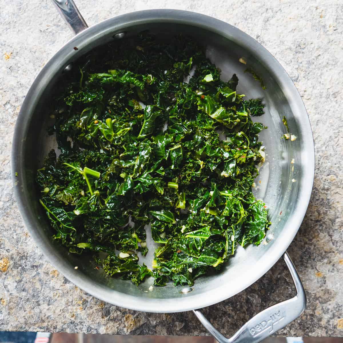 sauteed kale in deep frying pan