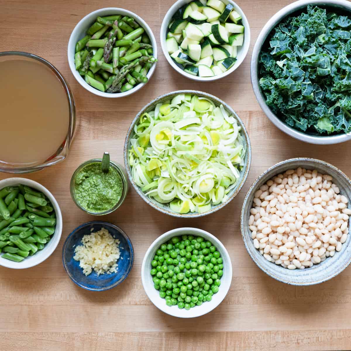 all prepared ingredients to make green minestrone soup. 