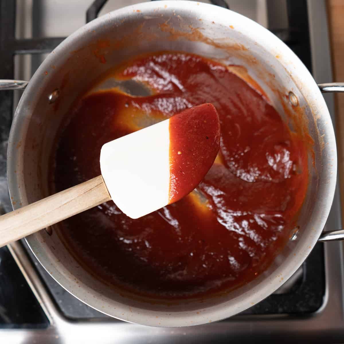 bbq sauce after it has simmered and thickened.