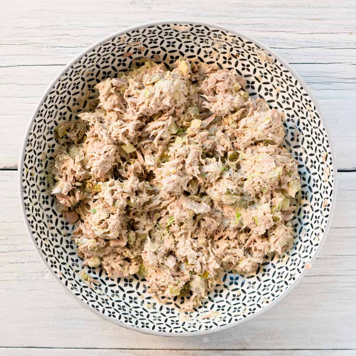 tuna salad mixed together in a bowl. 