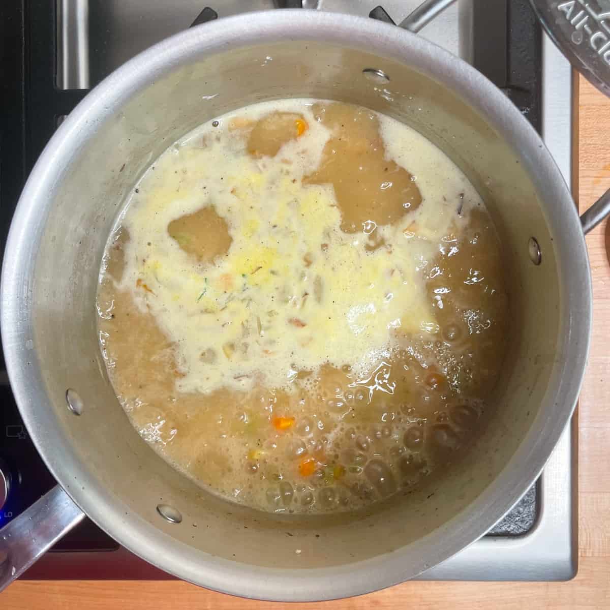 gravy boiling in a medium saucepan.