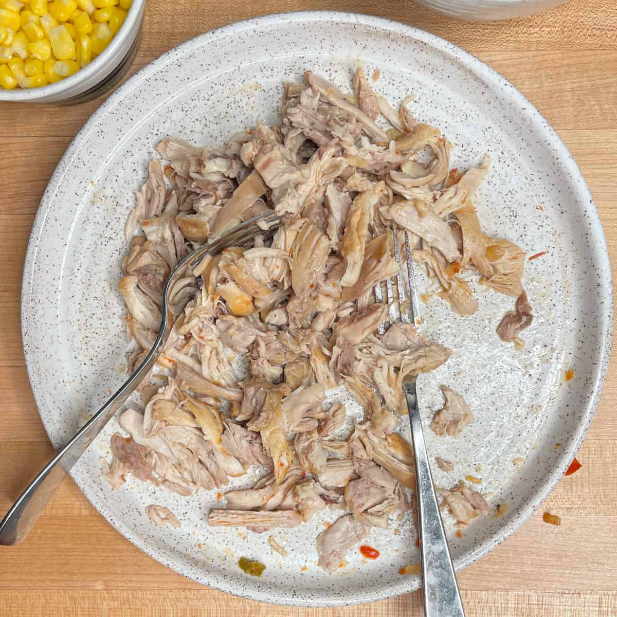 chicken removed from pot and shredded with 2 forks.