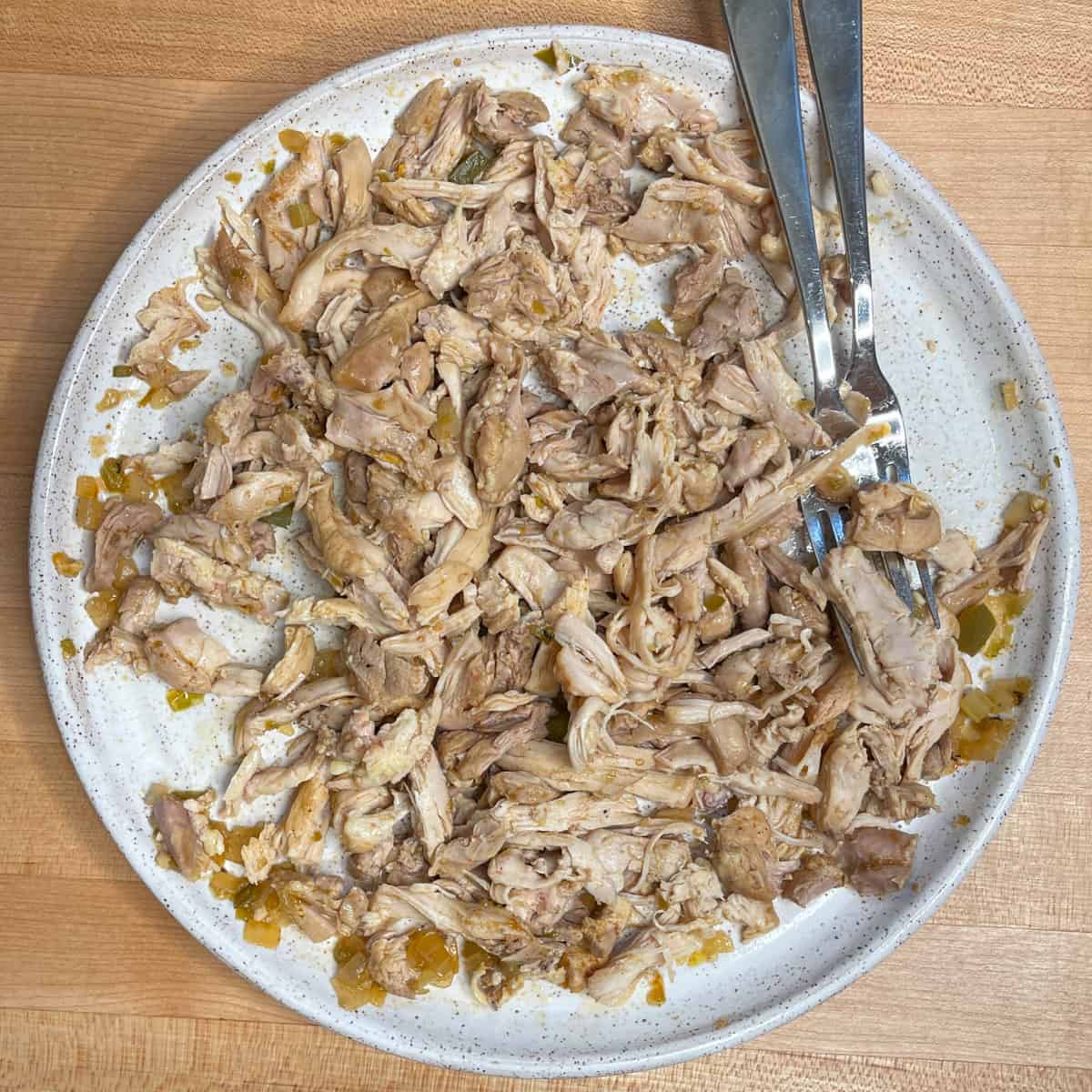 shredded chicken on a plate.