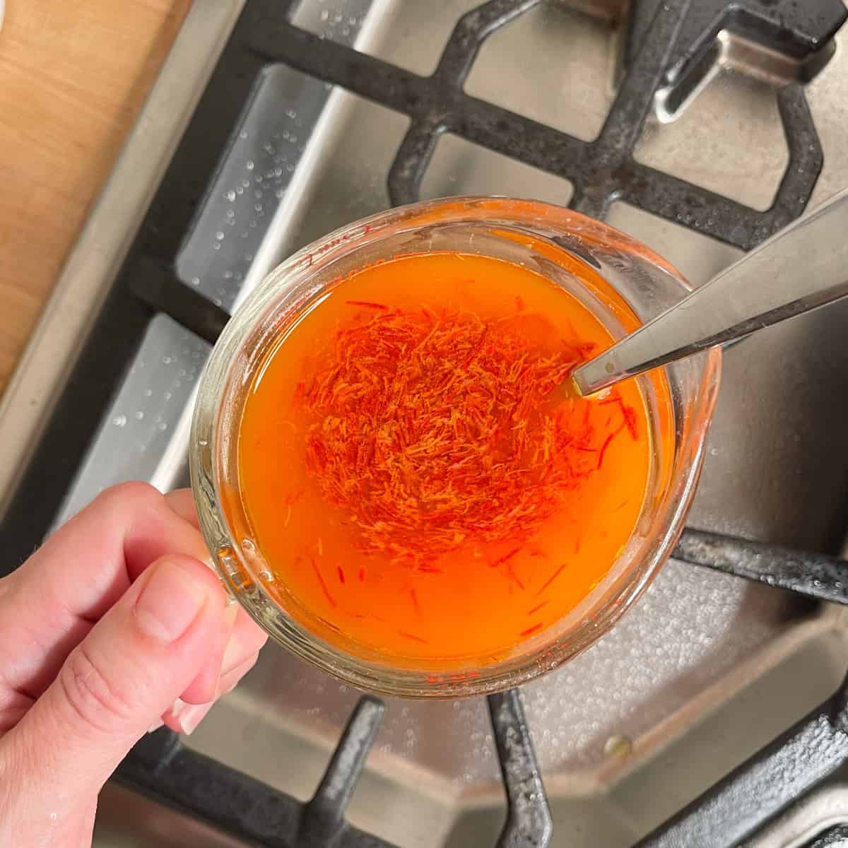 saffron steeping in chicken broth.