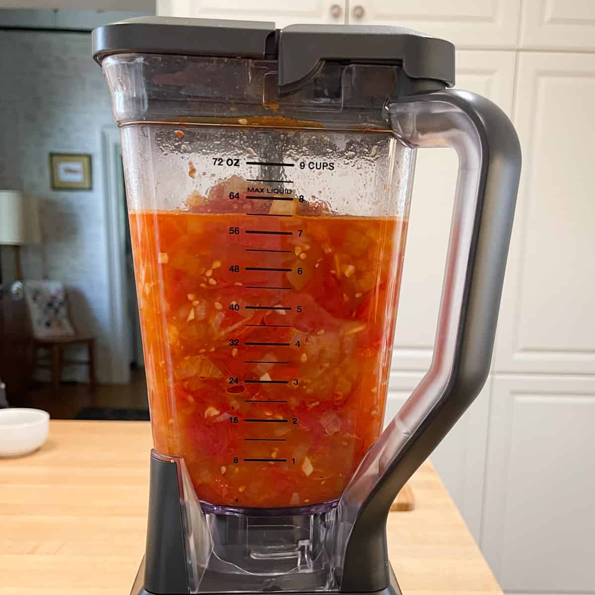 All the soup ingredients in a blender.