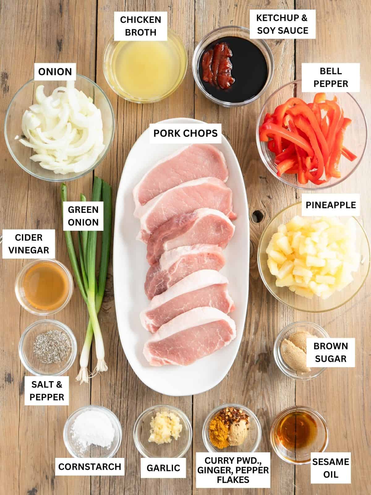 All ingredients to make sweet and sour pork chops laid out and labeled.